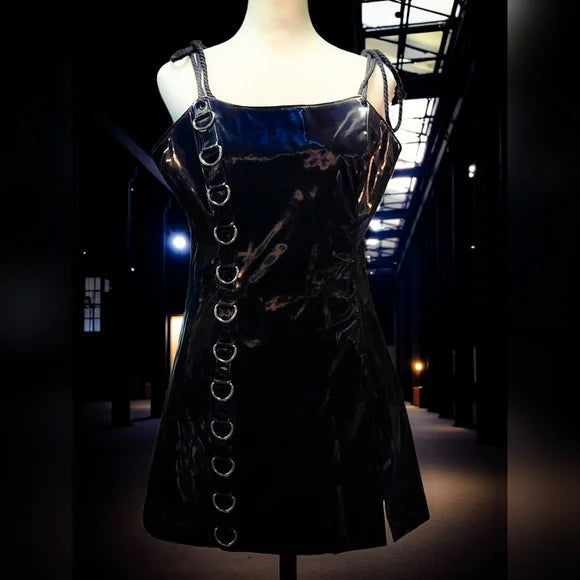 NWT Ambient O-Ring Mini Dress DARKER WAVS SZ LG  In a vinyl construction with a liquid sheen finish. O-ring hardware, adjustable rope shoulder ties, embroidered “D” logo on the back, and a back zipper closure