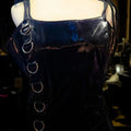 NWT Ambient O-Ring Mini Dress DARKER WAVS SZ LG  In a vinyl construction with a liquid sheen finish. O-ring hardware, adjustable rope shoulder ties, embroidered “D” logo on the back, and a back zipper closure